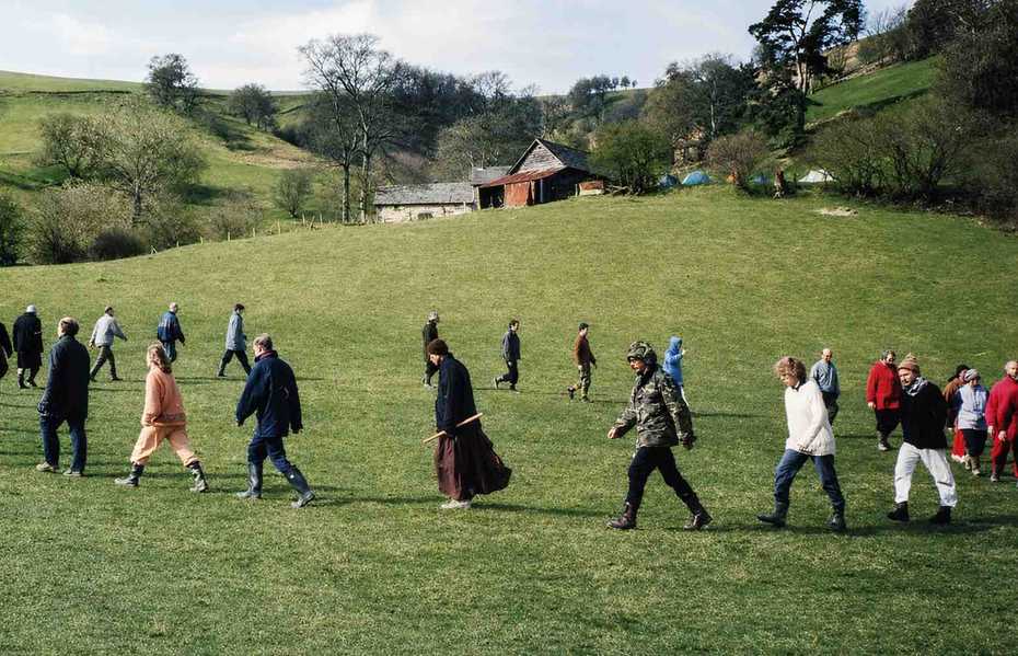 Walking meditation outdoors in a field with Chan Master Shengyen