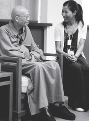 Rebecca Li sitting with and talking to Chan Master Shengyen